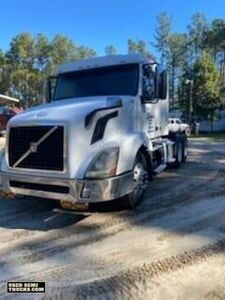 Lean and Mean 2012 Volvo VNL Day Cab Semi Truck.