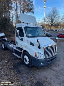 2012 Freightliner Cascadia 10 Speed Day Cab Semi Truck.