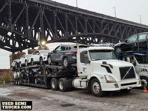 Used - 2007 Volvo VNL Day Cab Semi Truck and 2014 Trailer.