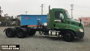 Preowned - 2011 Freightliner Cascadia Day Cab Semi Truck.