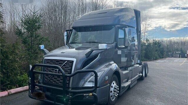 A black 2020 Volvo VNL 670 sleeper truck without a trailer